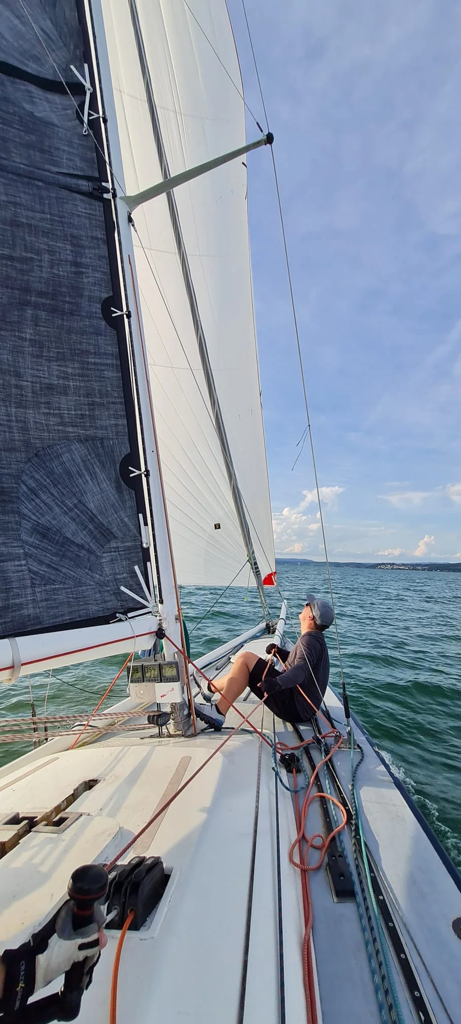 Oliver Heisel trimming the sails on the water